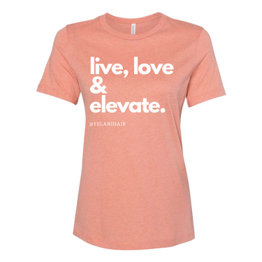 Embrace positivity and style with the 'Live, Love & Elevate' women’s relaxed fit t-shirt. Made from soft, breathable fabric, this shirt offers both comfort and flair with a flattering, relaxed silhouette. Whether you're out with friends or enjoying a casual day, the inspirational message encourages you to live your best life and elevate your mood. Perfect for pairing with jeans, leggings, or shorts, this versatile tee adds a touch of motivation and style to any wardrobe.